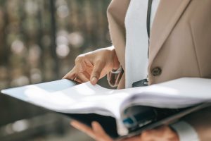 open document in woman hands. credit pixels- 'ono kosuki'