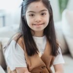 young girl with spot on forehead pexels-nicola-barts-7943691