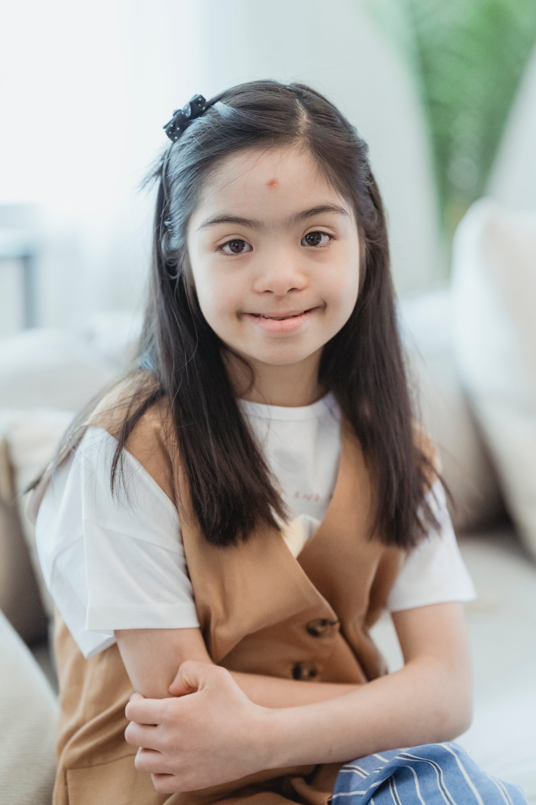 young girl with spot on forehead pexels-nicola-barts-7943691